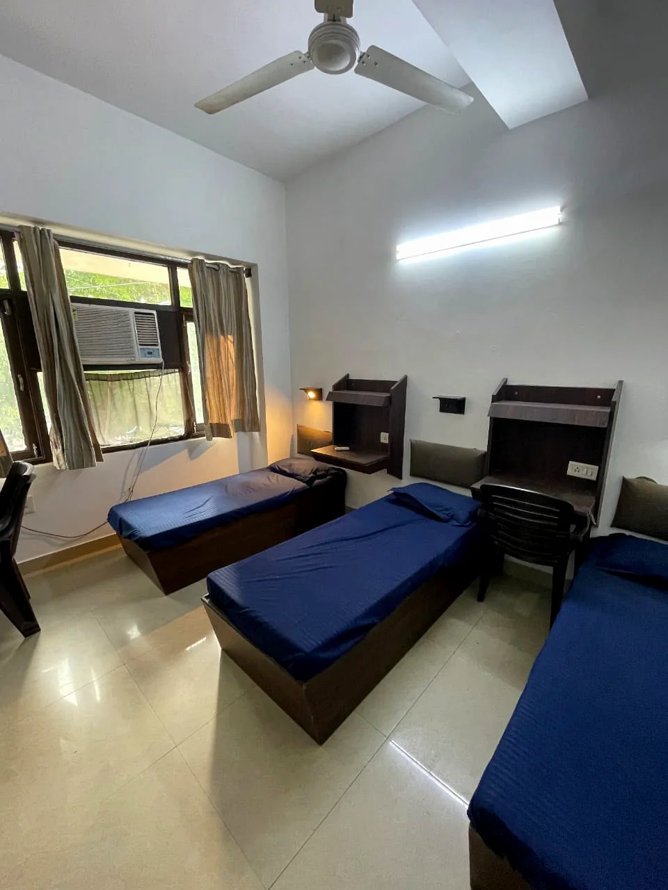 Three-bed room at Safe House PG