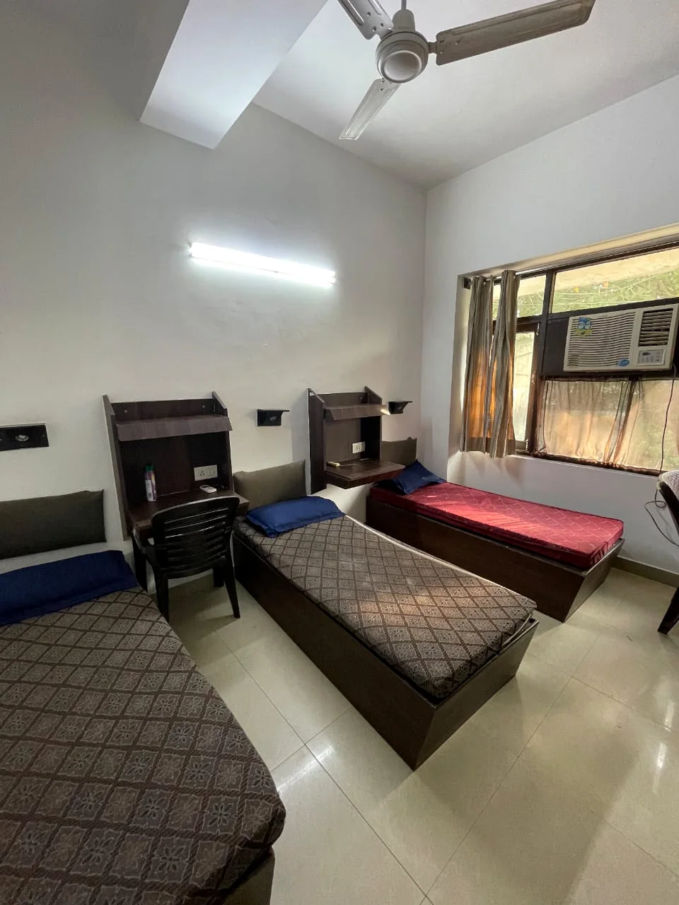 Actual shared room and study setup at Safe House